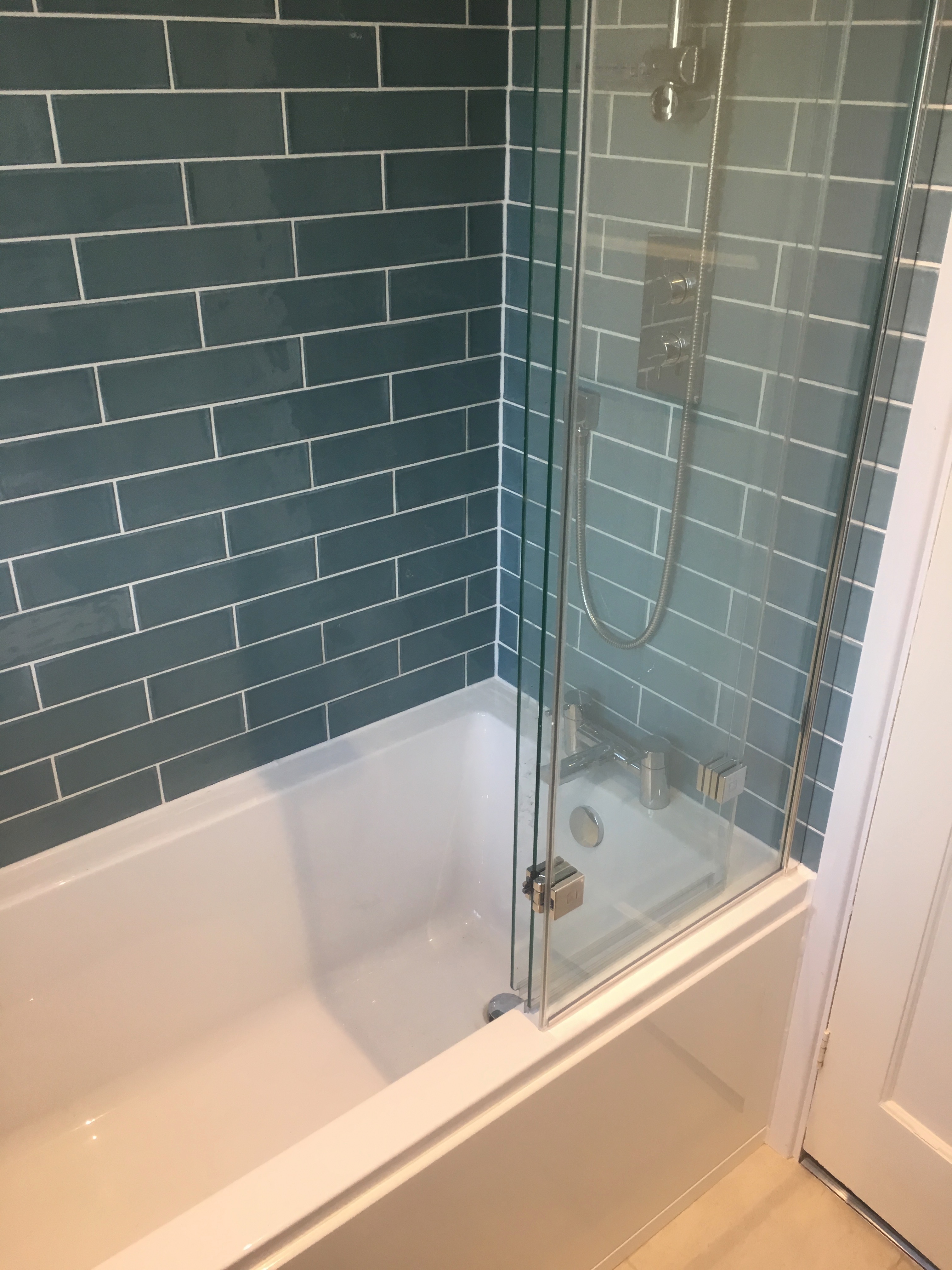 Green tiled top quality bathroom remodel by DSB Ltd Torbay
