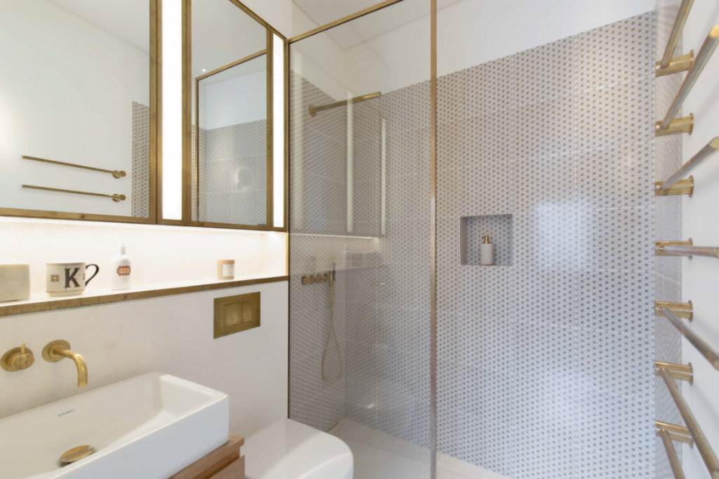 white and gold shower room 